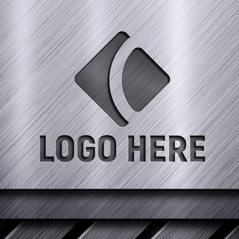 Free Realistic Laser Cut On Metallic Silver Background Logo Mockup PSD