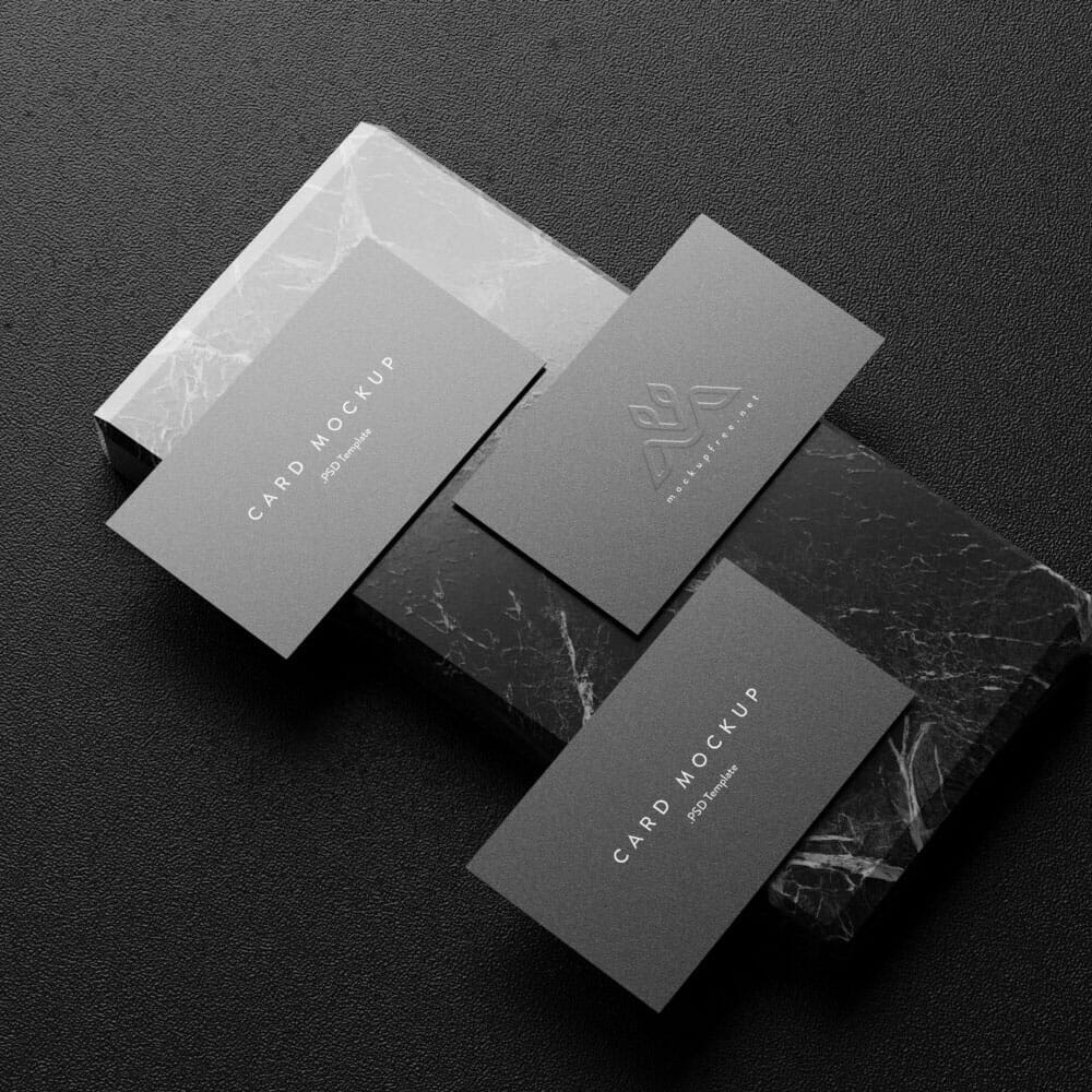 Free Business Cards On A Marble Block Mockups PSD