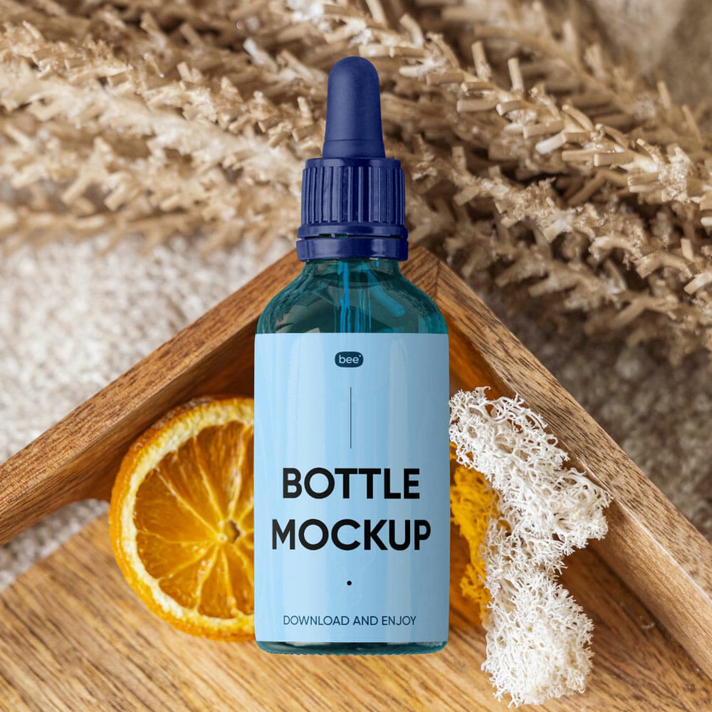 Free Dropper Bottle On Wooden Tray Mockup PSD