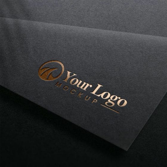 Free Luxury Gold Logo Mockup On Black Paper Texture PSD