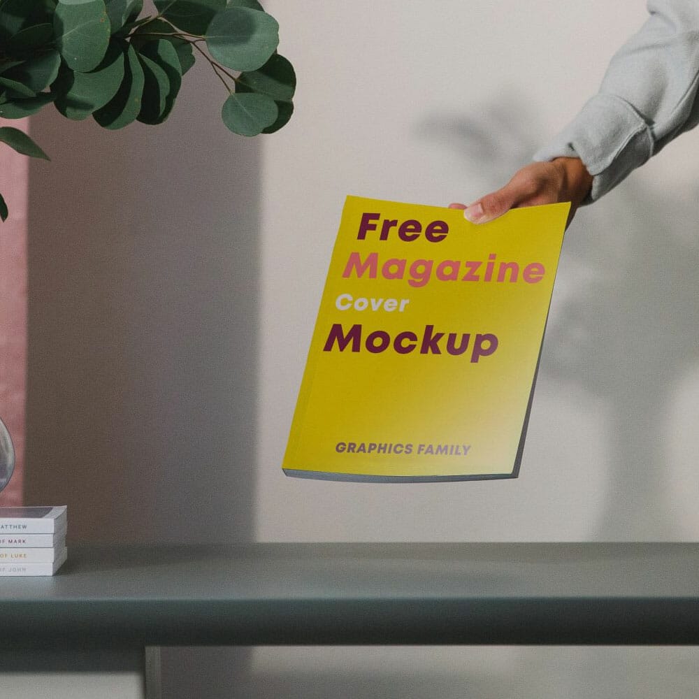Free Minimal Book Magazine In Hand Mockup PSD