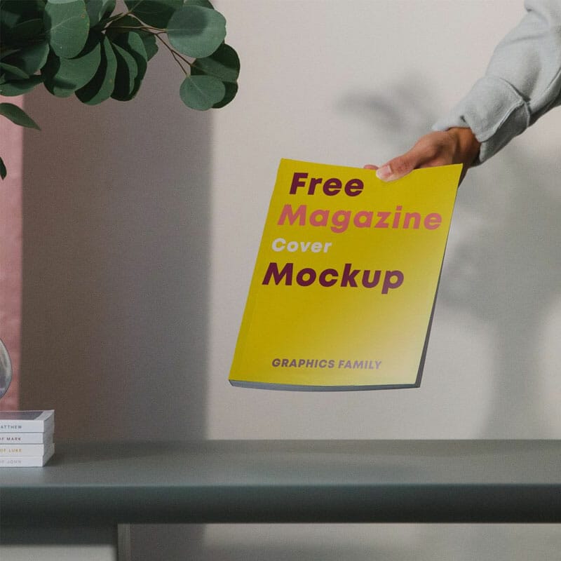 Free Minimal Book Magazine In Hand Mockup PSD