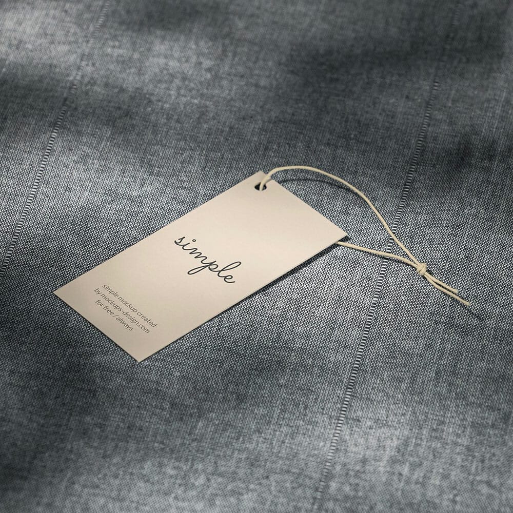 Free Label Tag On Grey Material Mockup PSD