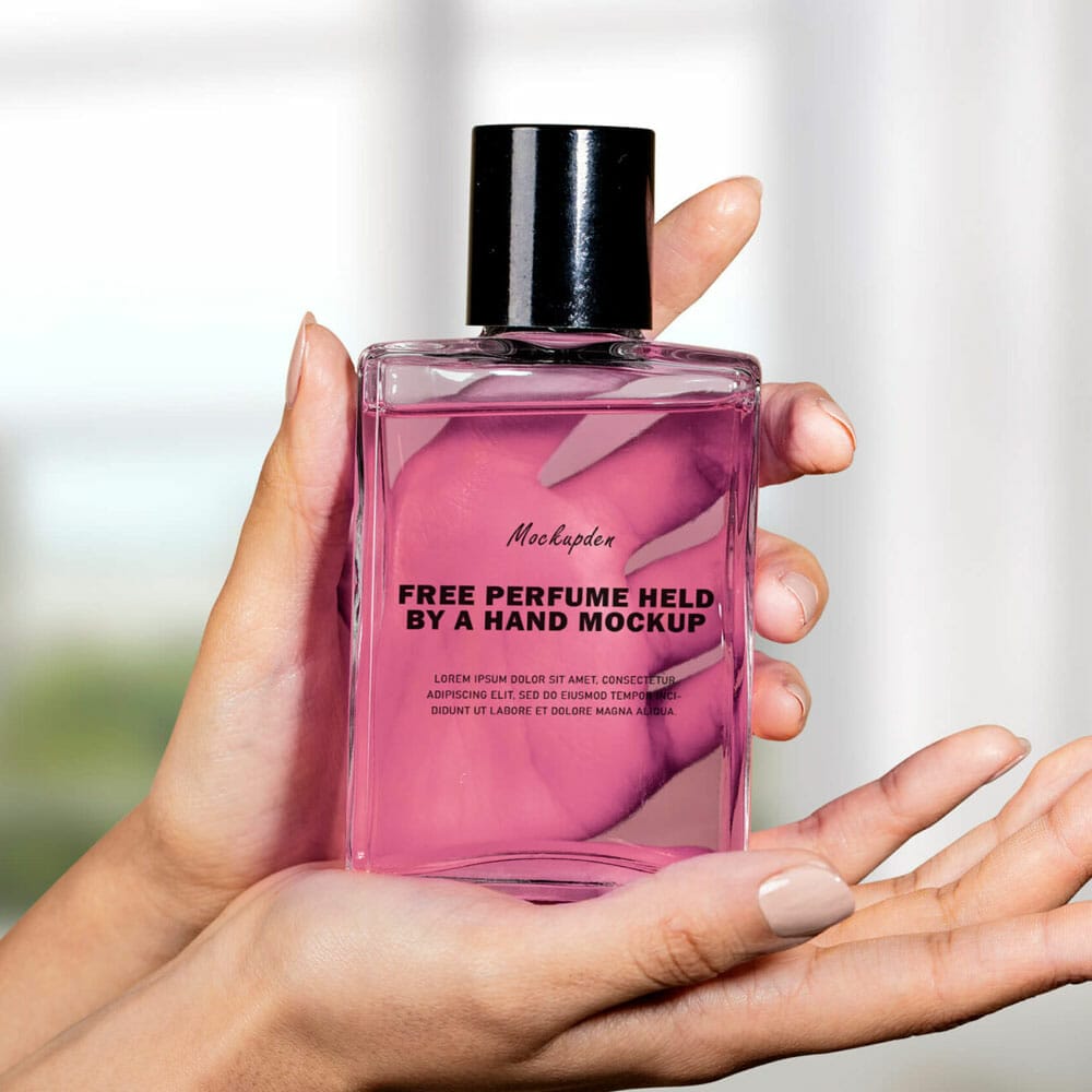 Free Perfume Held By A Hand Mockup PSD Template
