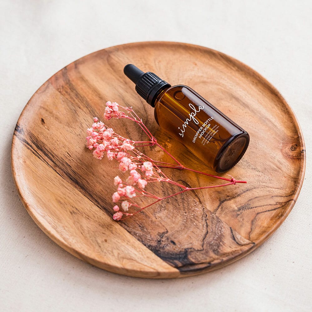 Free Amber Dropper Bottle On Wooden Tray Mockup PSD