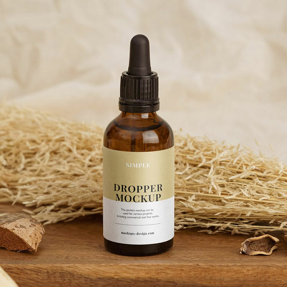 Free Dropper Bottle With Essential Oil Mockup PSD