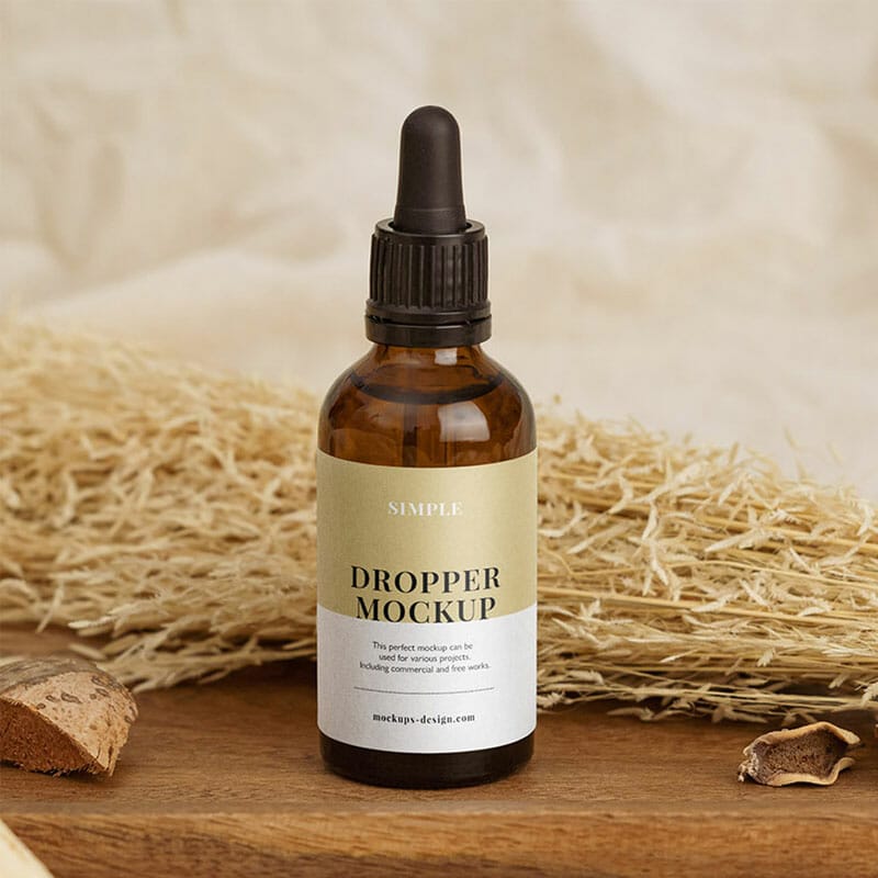 Free Dropper Bottle With Essential Oil Mockup PSD