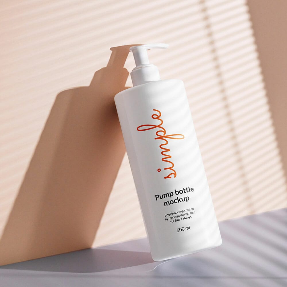 Free White Pump Bottle Lying On Wall Mockup PSD