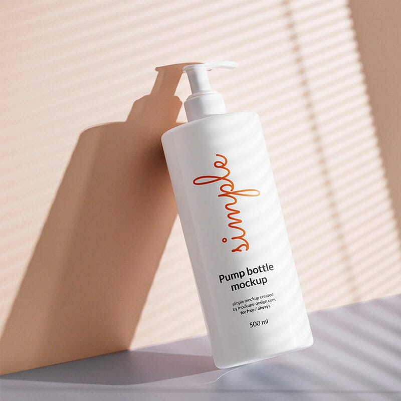 Free White Pump Bottle Lying On Wall Mockup PSD