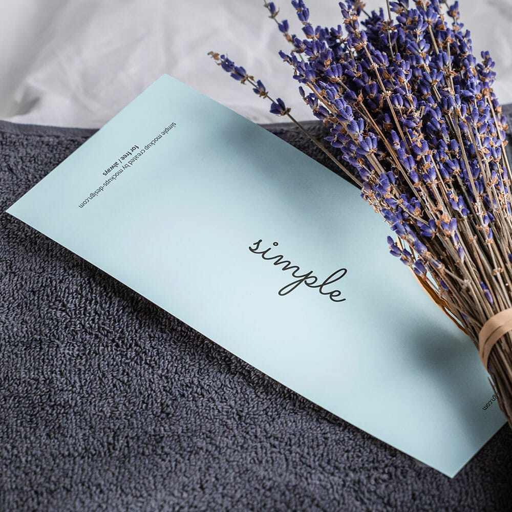 Free DL Flyer On Towel With Lavender Mockup PSD