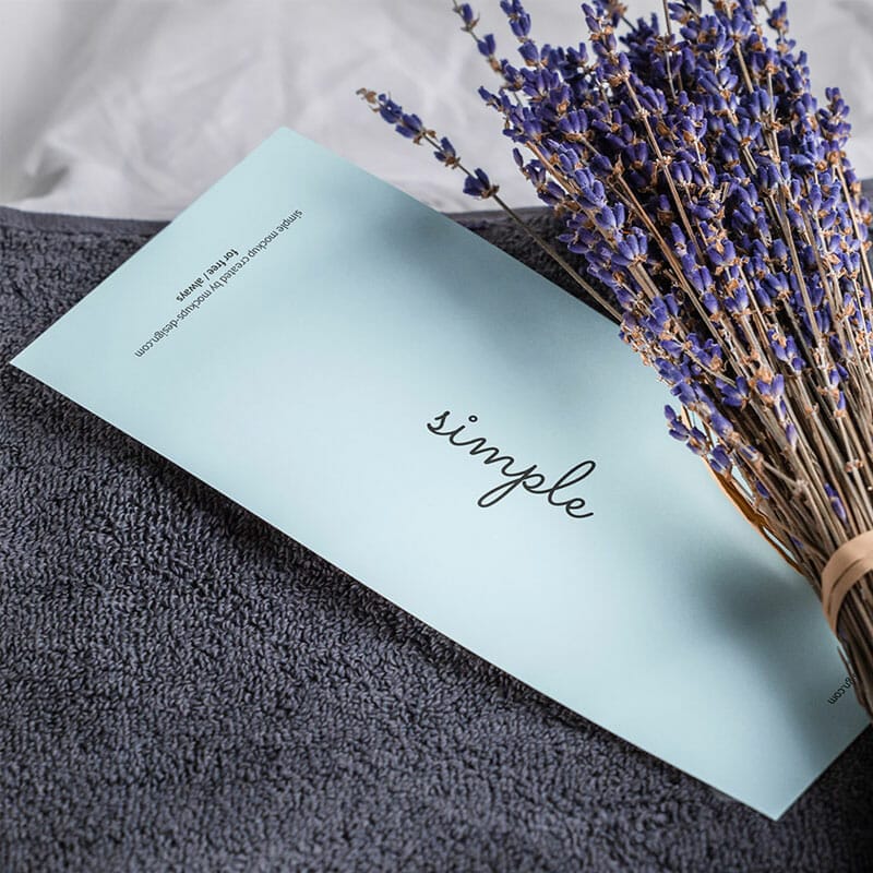 Free DL Flyer On Towel With Lavender Mockup PSD