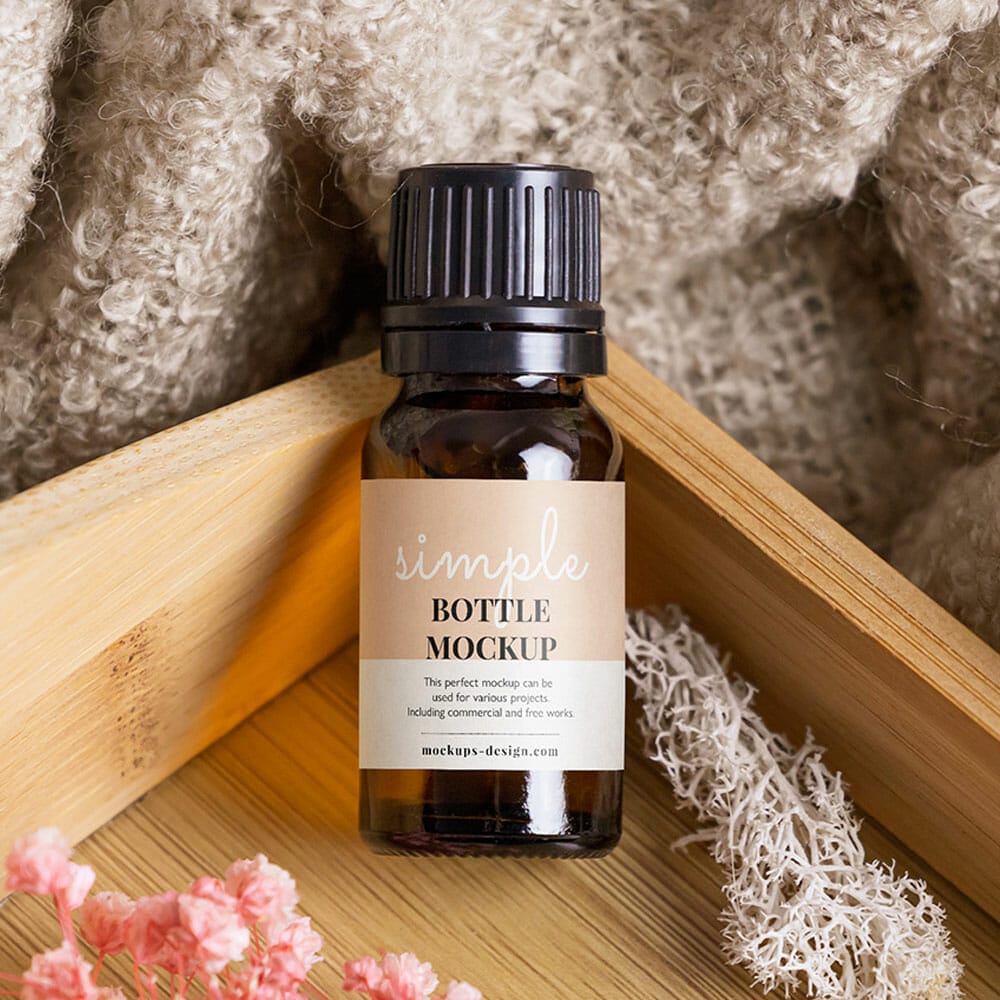 Free Essentail Oil Bottle In The Tray Mockup PSD