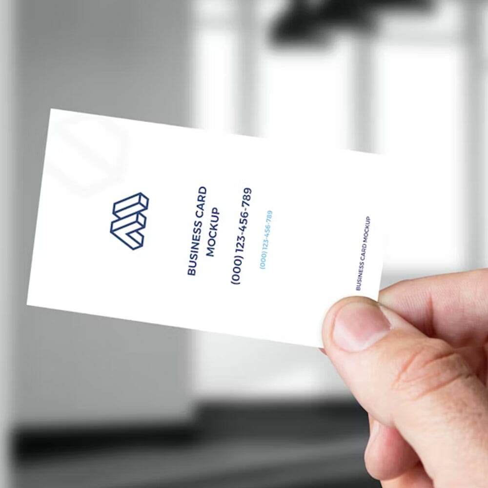 Free Hand Holding Business Card Mockup PSD