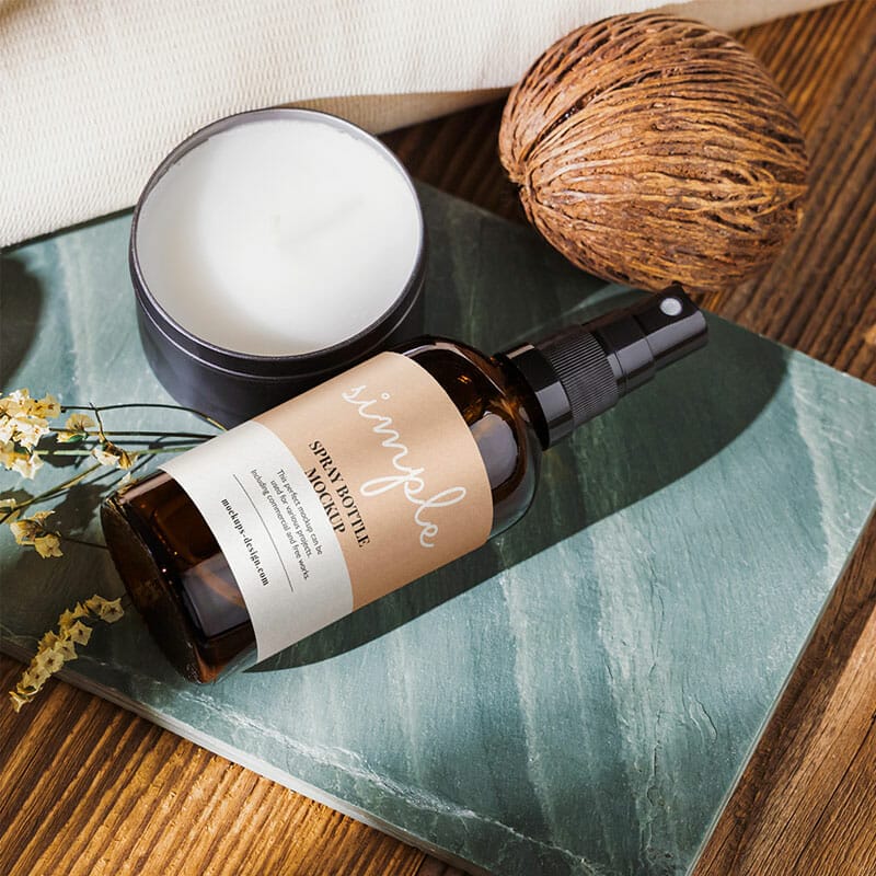 Free Mist Spray Bottle On Green Tile Mockup PSD