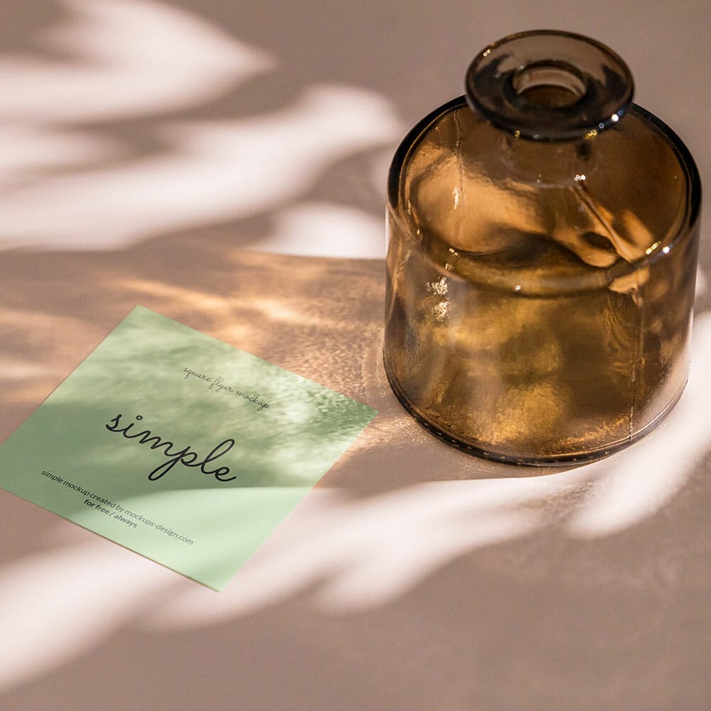 Free Square Flyer With Brown Bottle Mockup PSD