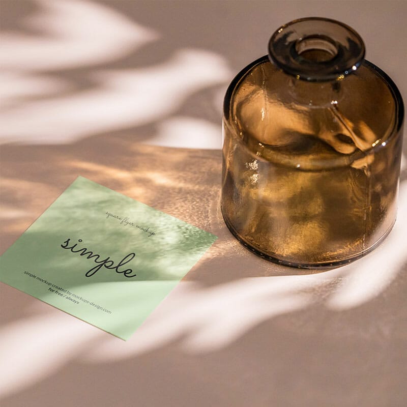 Free Square Flyer With Brown Bottle Mockup PSD