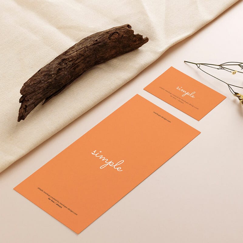 DL Flyer With Business Card On Beige Background Mockup PSD