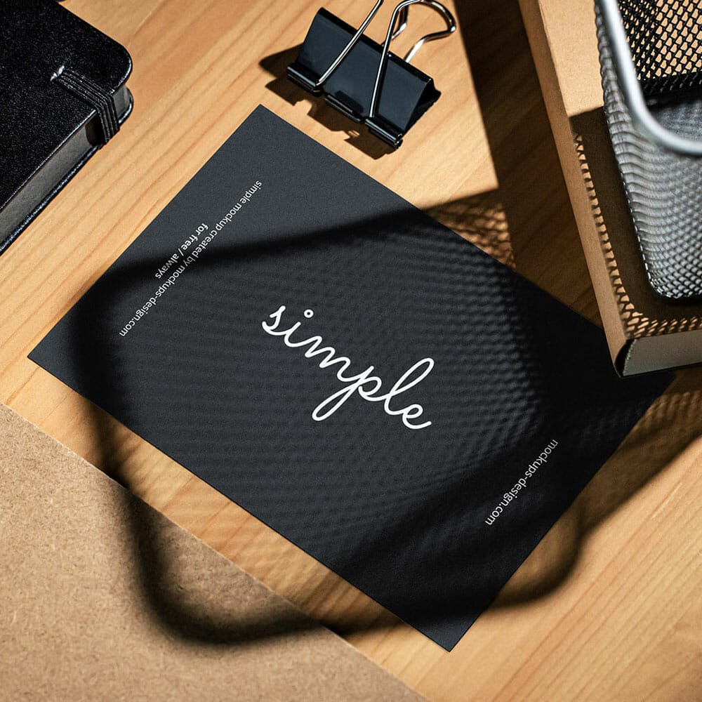 Free A6 Flyer In The Office Mockup PSD