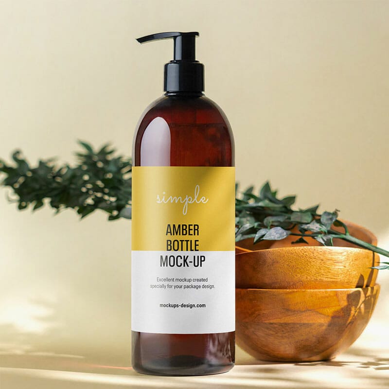 Free Amber Pump Bottle On Natural Background Mockup PSD