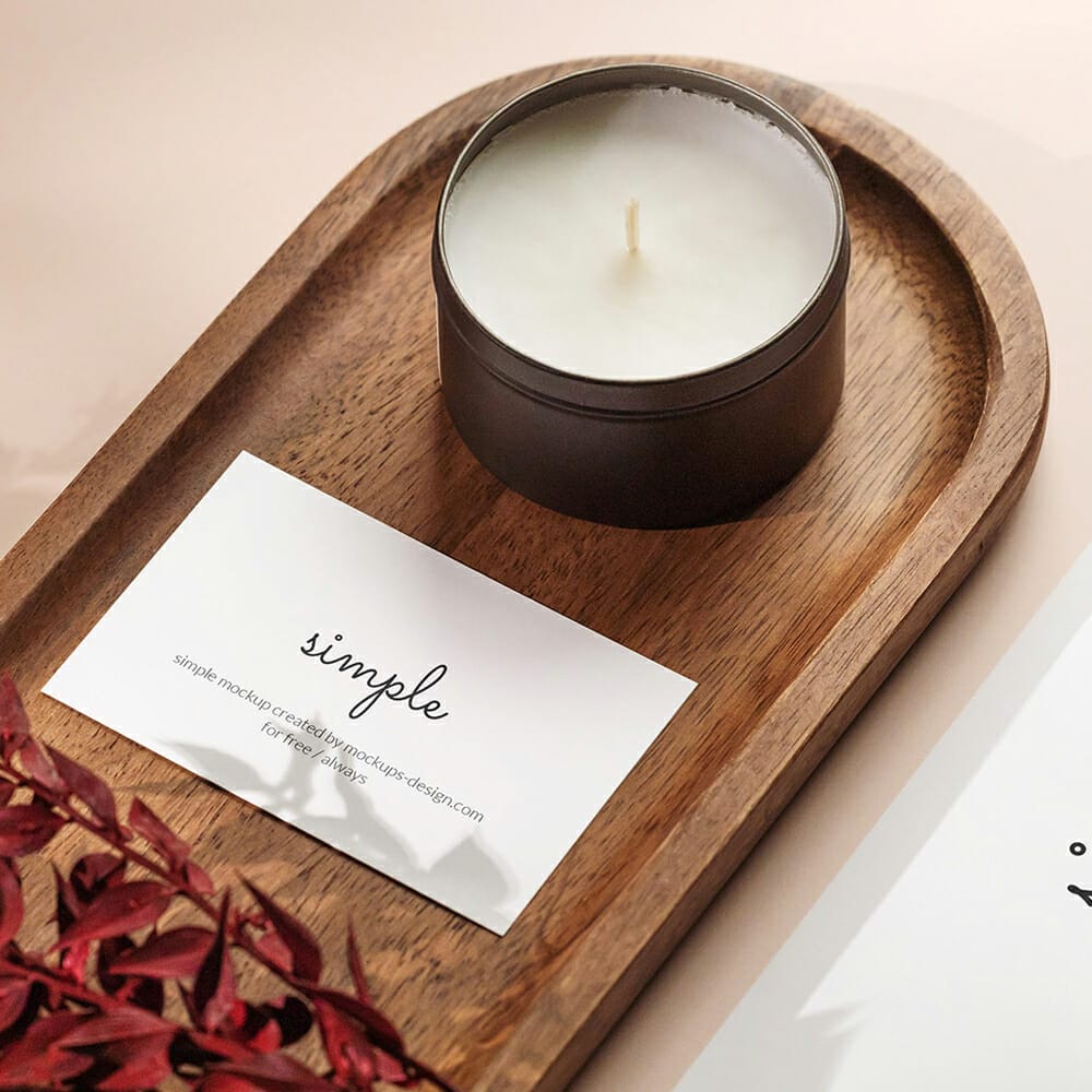 Free Business Card With Paper And Candle Mockup PSD