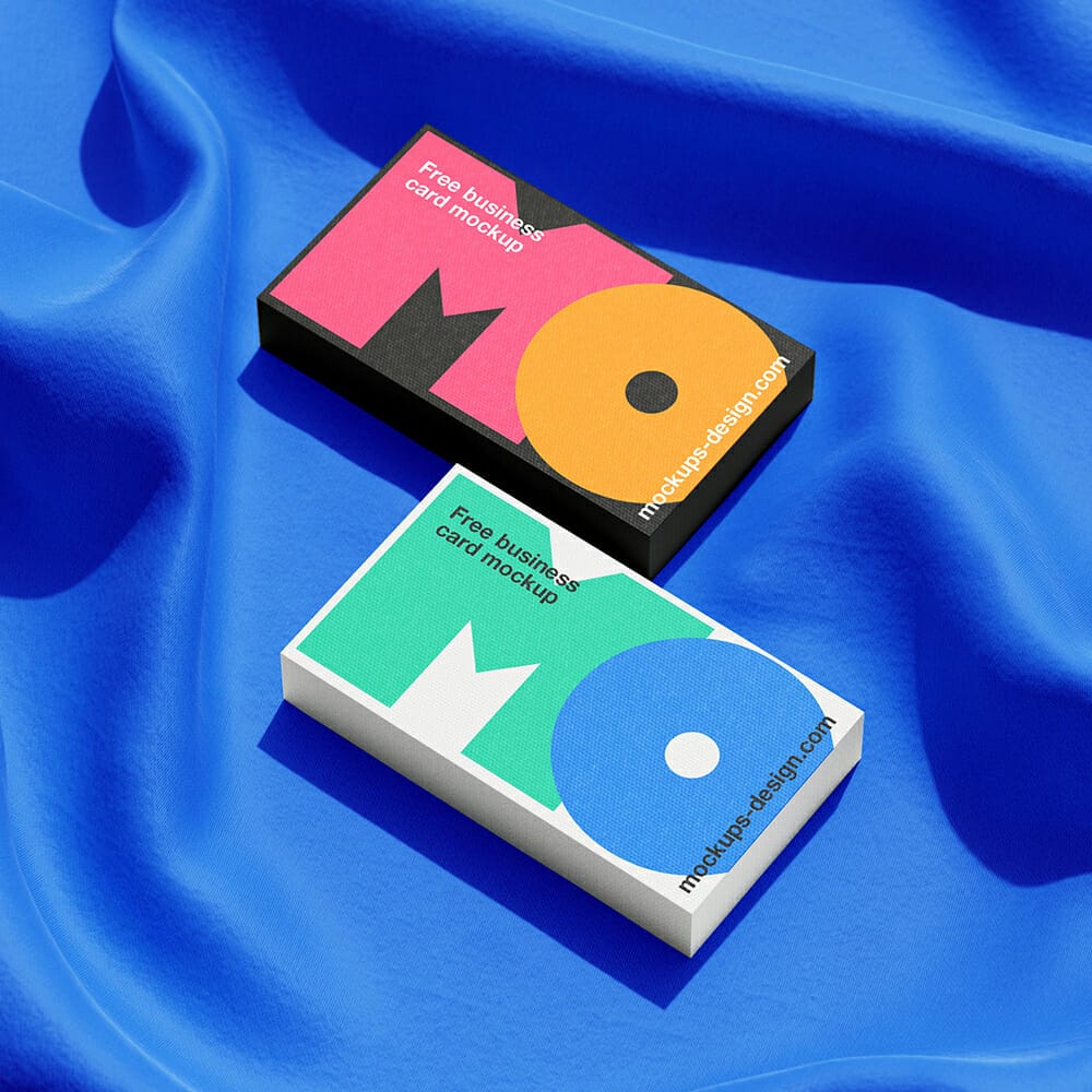 Free Business Cards Lying On A Fabric Mockup PSD