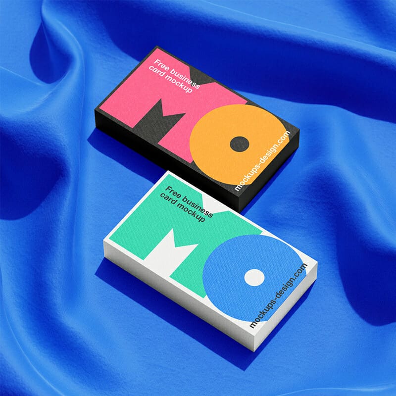 Free Business Cards Lying On A Fabric Mockup PSD