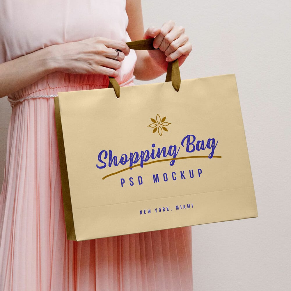 Free Download Women Holding Shopping Bag Mockup PSD
