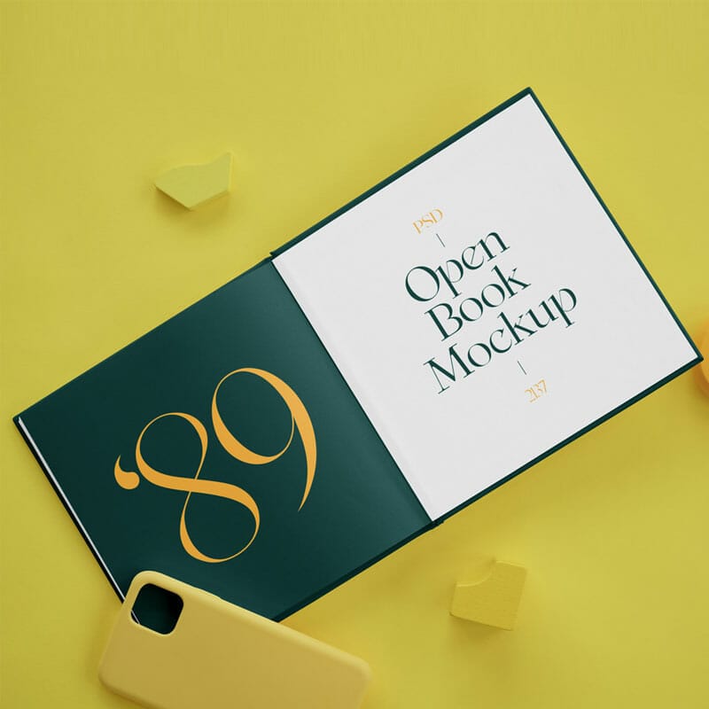Free Hard Cover Book On Desk Mockups PSD
