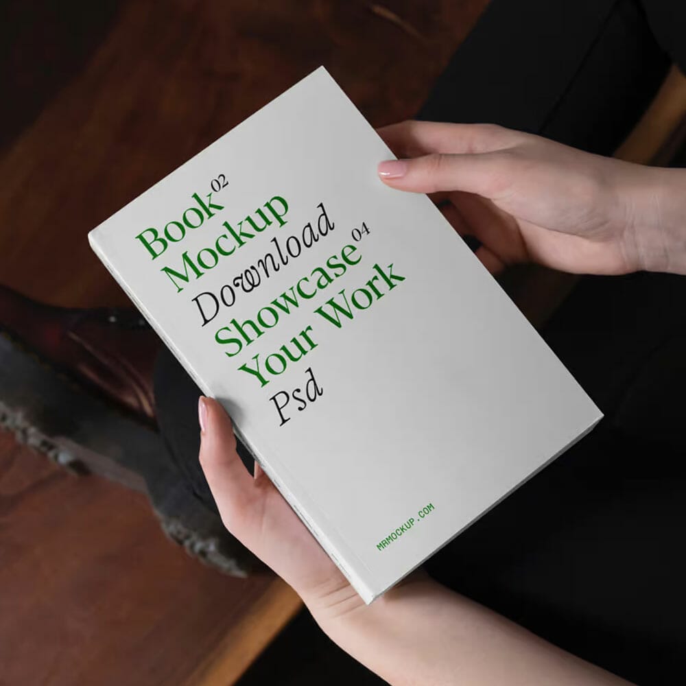 Free Perspective Book In Hands Mockup PSD