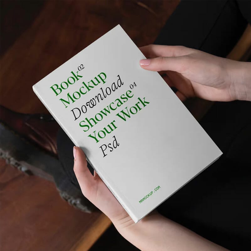 Free Perspective Book In Hands Mockup PSD
