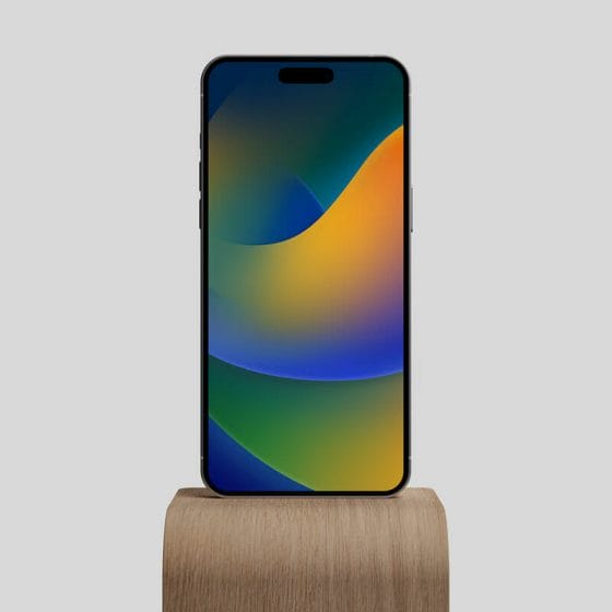 Free iPhone 14 Pro Max On Wood Stand Mockup PSD