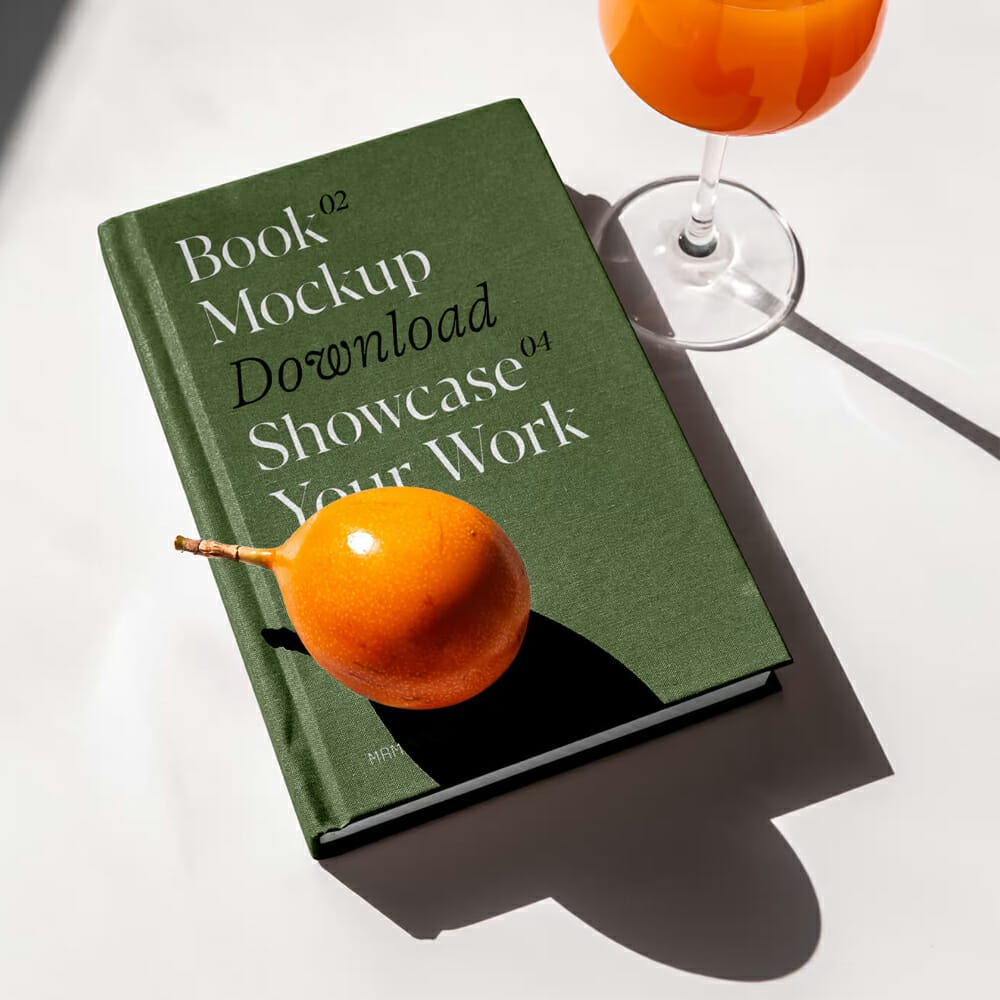 Free Book Cover On Table PSD Mockup