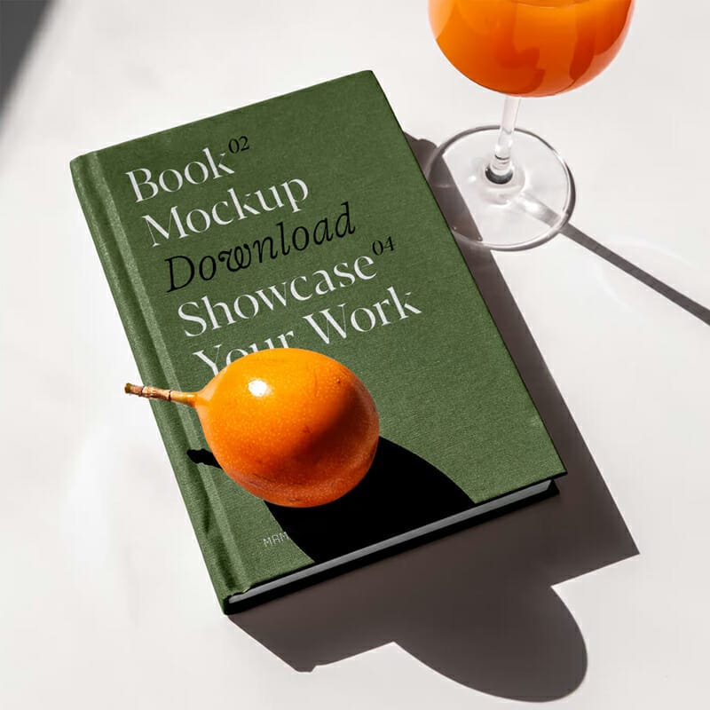 Free Book Cover On Table PSD Mockup