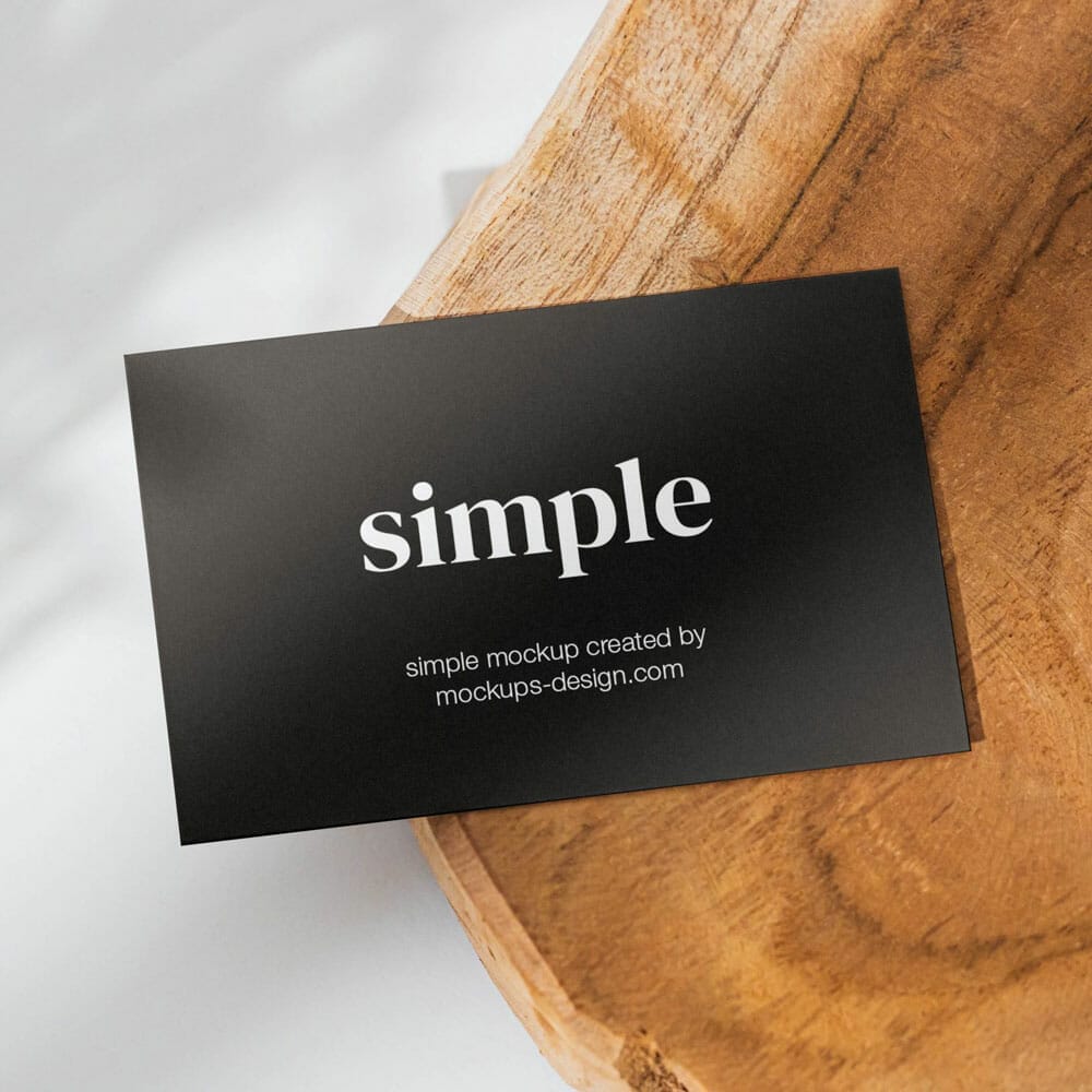 Free Business Card On A Slice Of Wood Mockup PSD