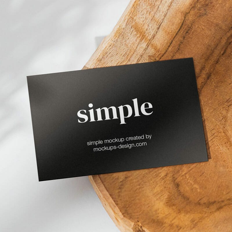 Free Business Card On A Slice Of Wood Mockup PSD