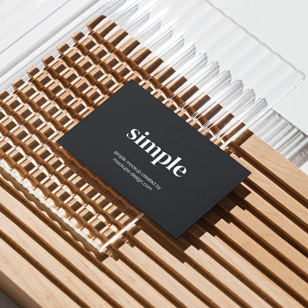 Free Business Card On Piece Of Glass Mockup PSD