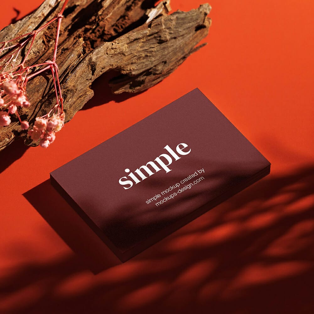 Free Business Card On Red Background Mockup PSD