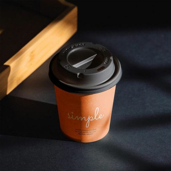 Free Coffee Cup On Black Background Mockup PSD