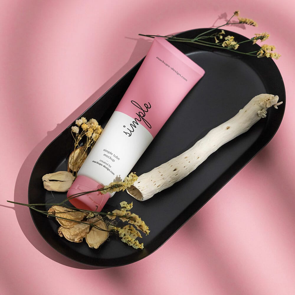 Free Cosmetic Tube On Black Tray Mockup PSD