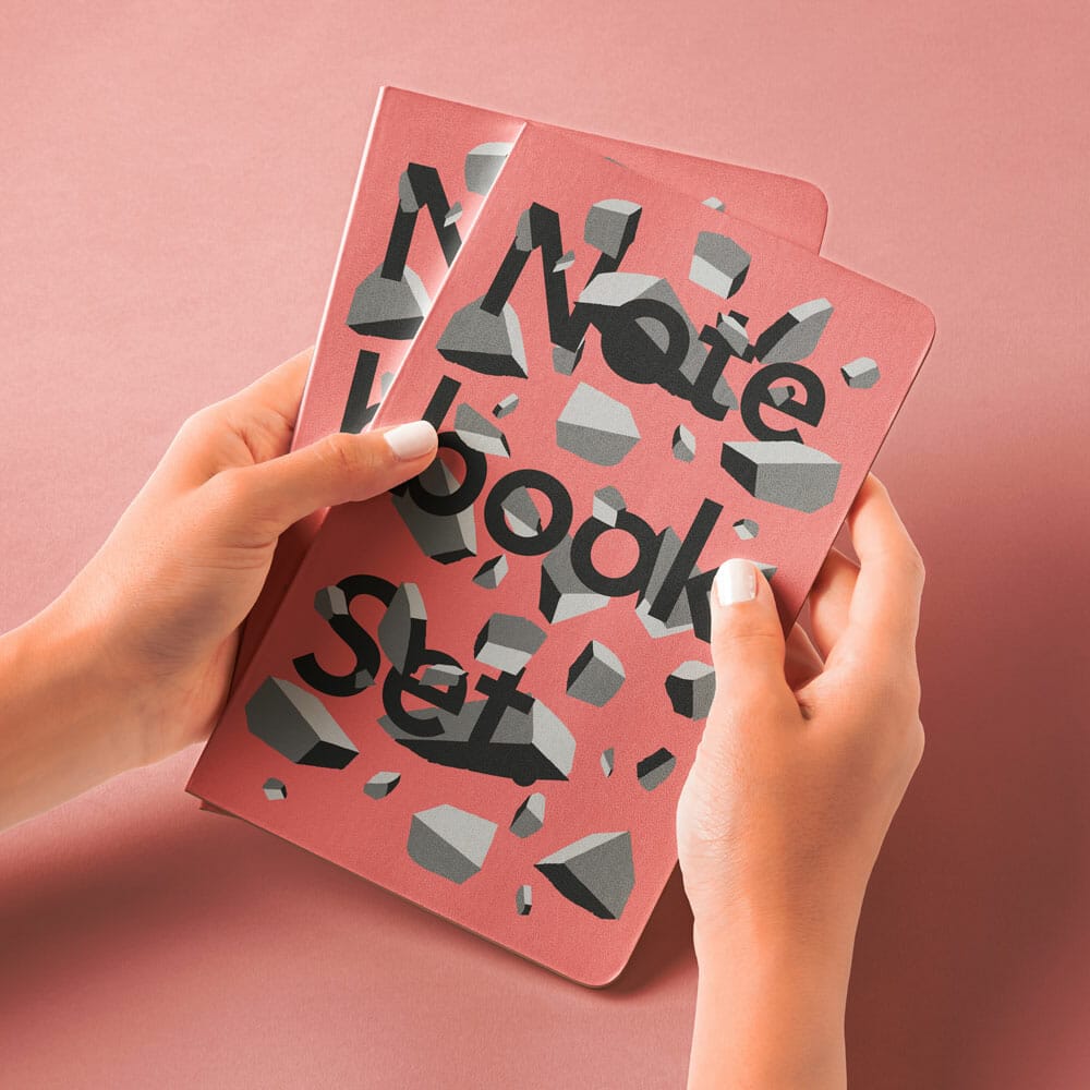 Free Hands Holding PSD Notebook Mockup