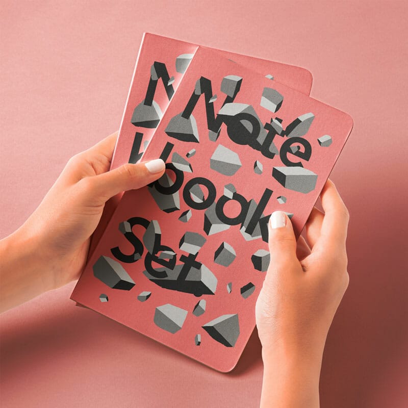 Free Hands Holding PSD Notebook Mockup