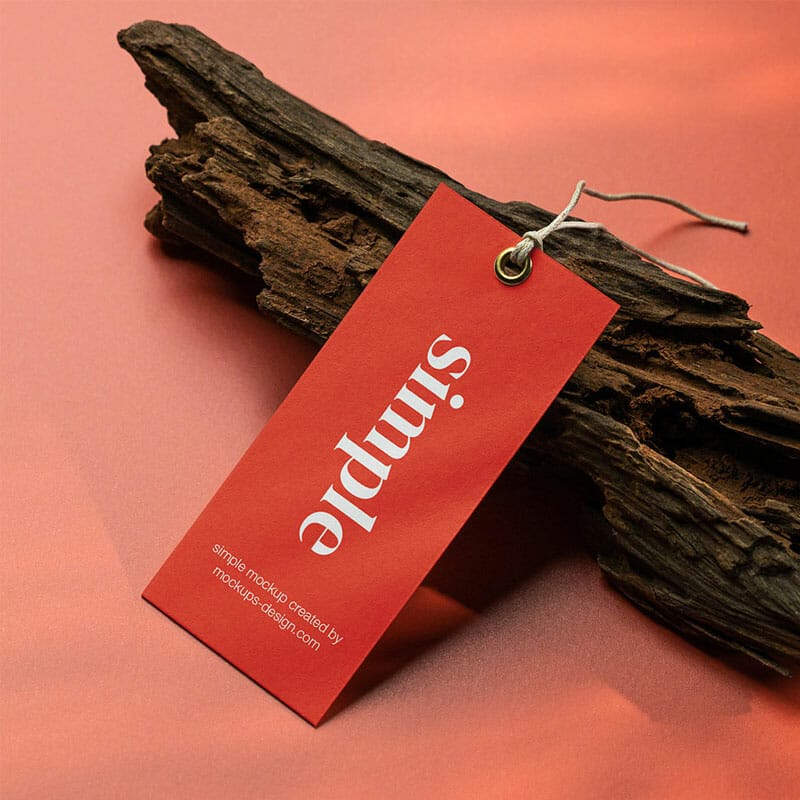 Free Label Tag On Red Background Mockup PSD