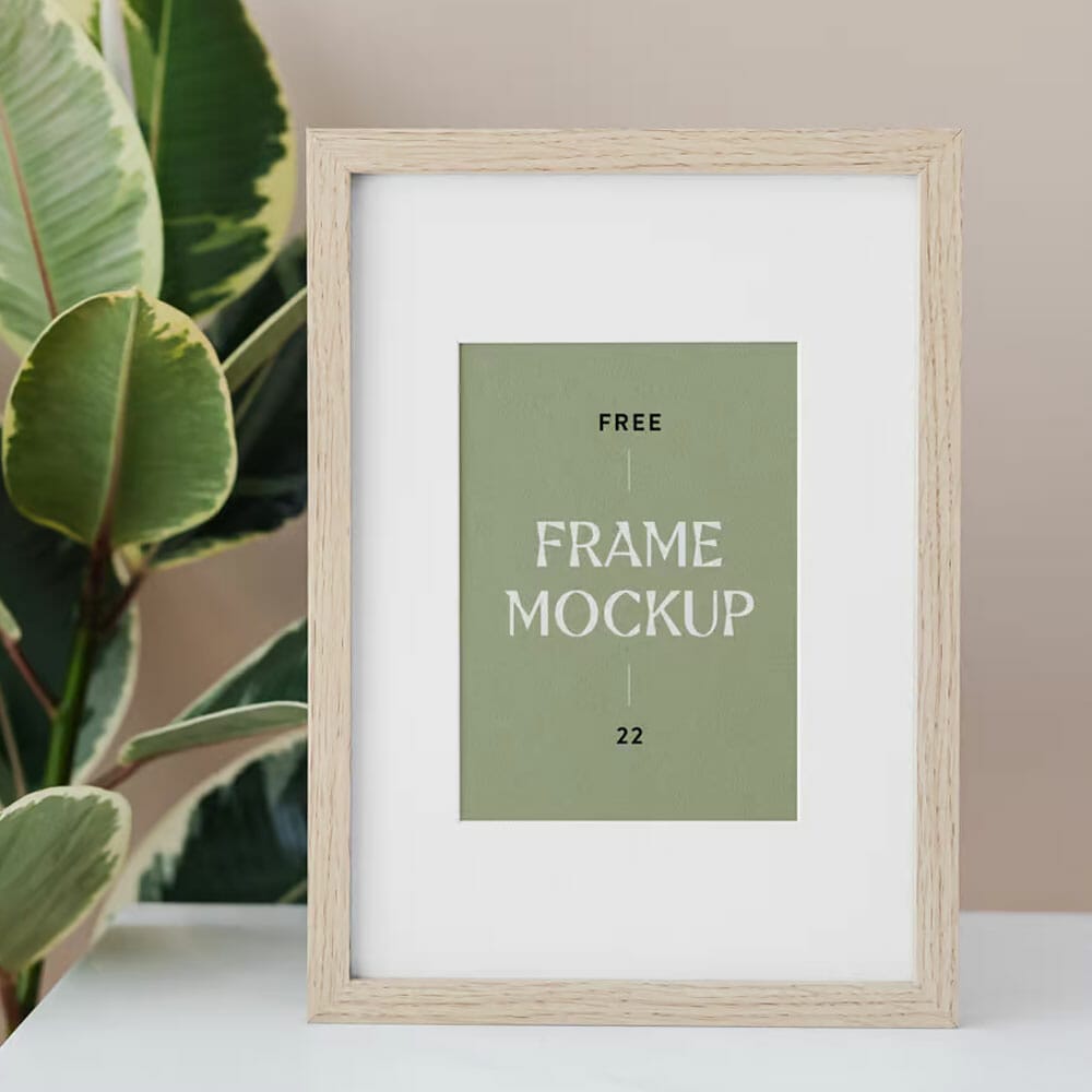 Free Wood Frame With Plant Mockup PSD