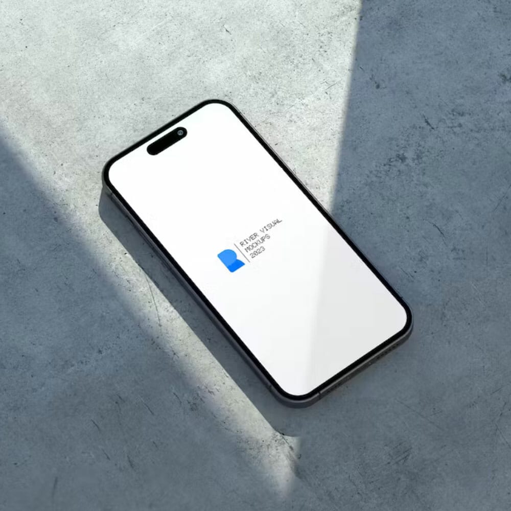 Free iPhone 14 Pro Concrete Mockup PSD