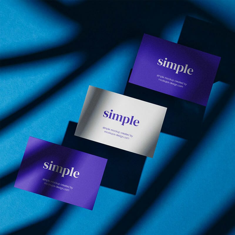 Three Business Card On Blue Background Mockup PSD