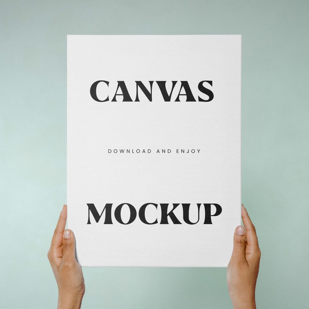 Free Canvas In Hands Mockup PSD