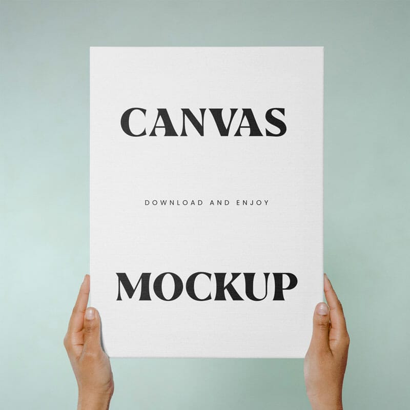 Free Canvas In Hands Mockup PSD