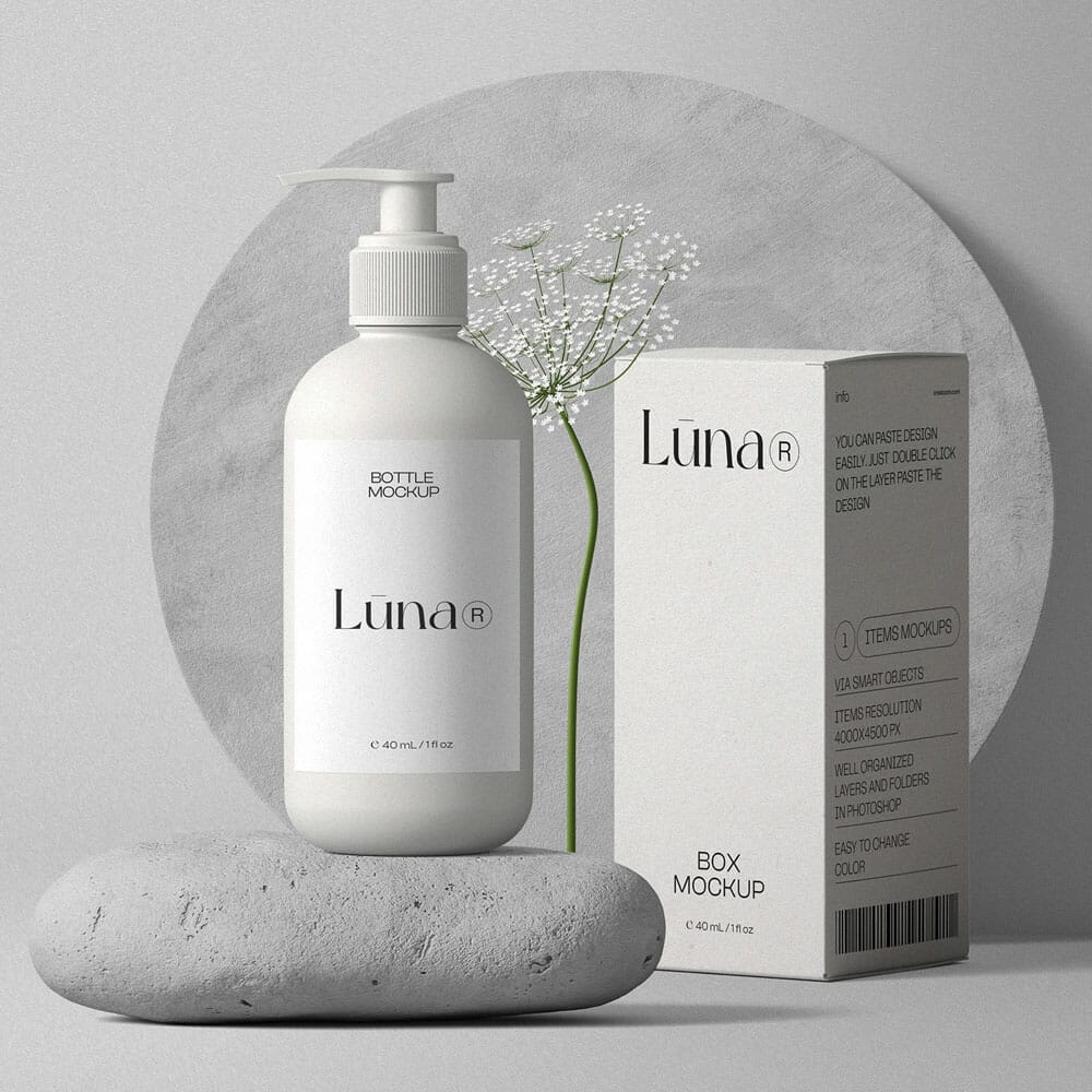 Free Cosmetic Bottle With Pump And Paper Box Mockups On Stone Front View PSD
