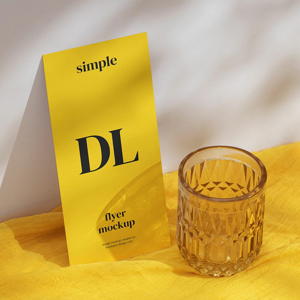 Free DL Flyer On Yellow Fabric Mockup PSD