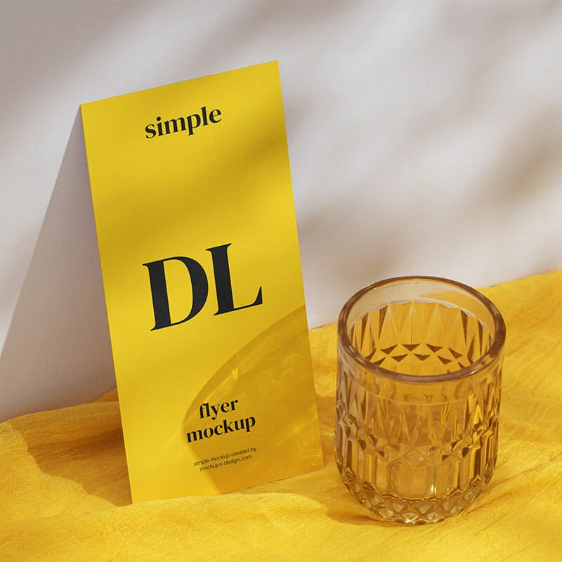 Free DL Flyer On Yellow Fabric Mockup PSD